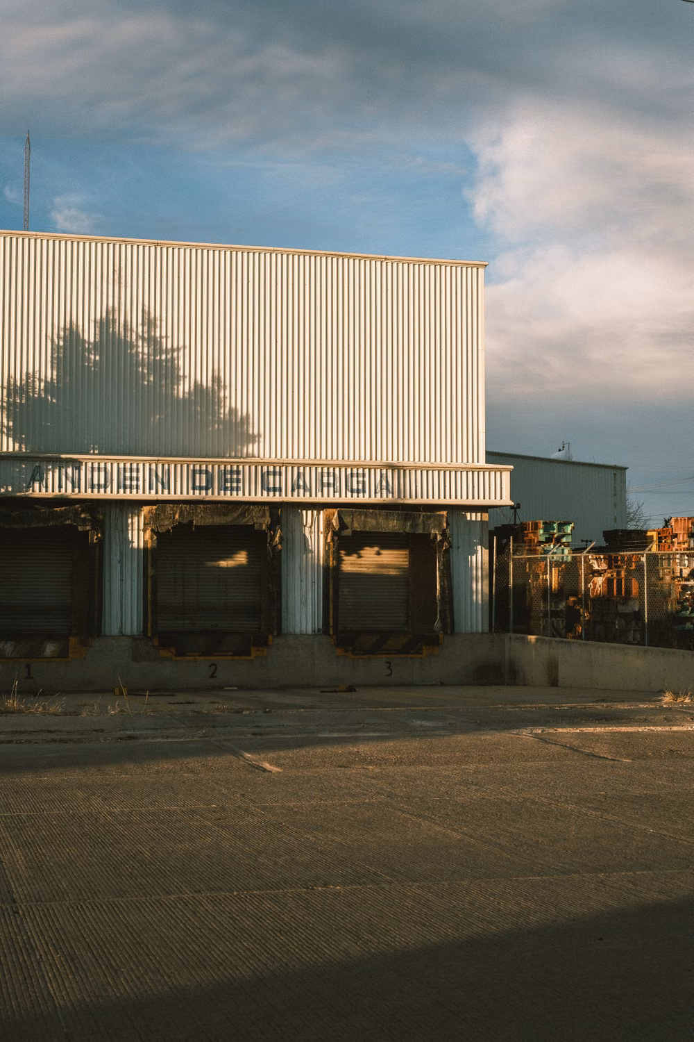 Industrial warehouse loading docks in morning light